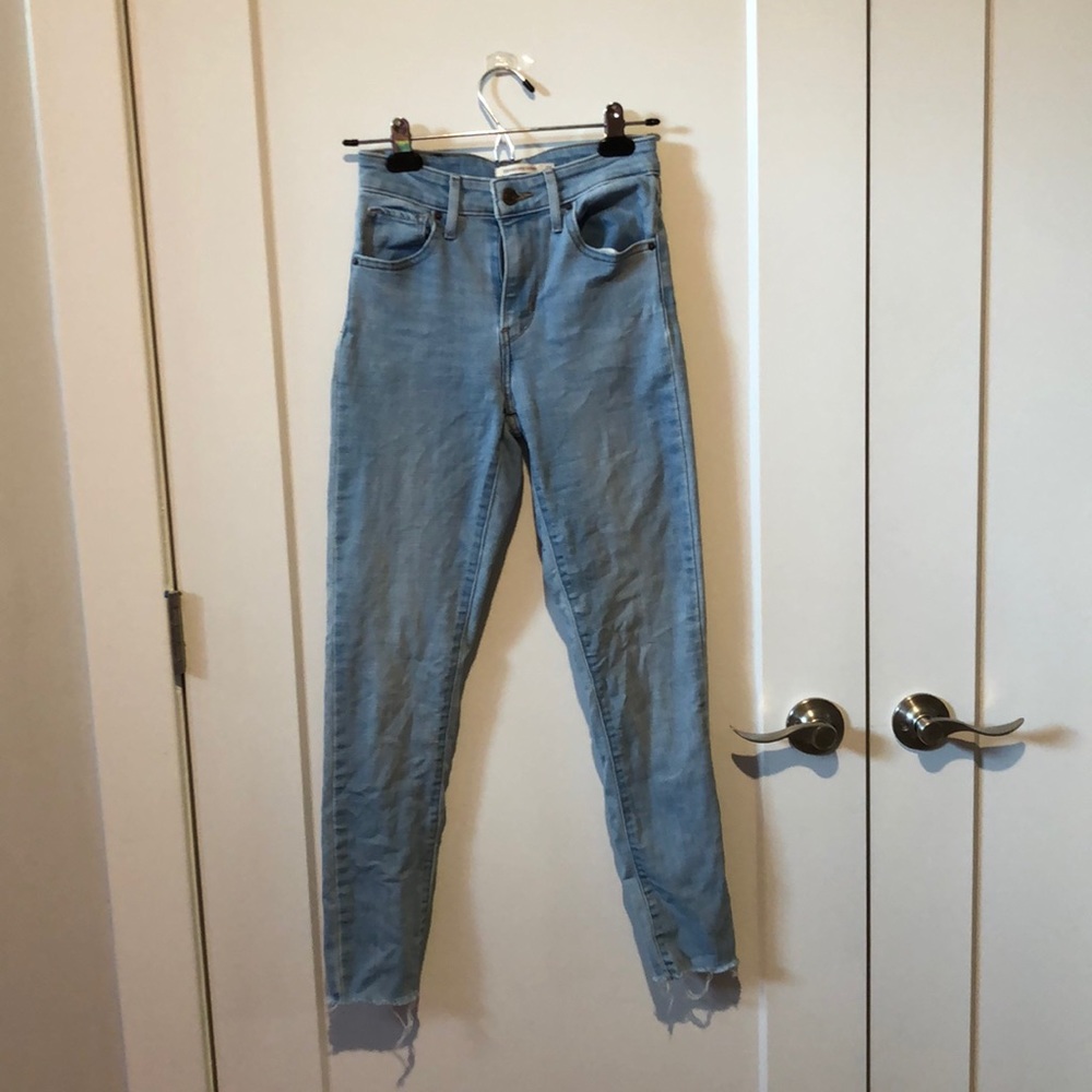 Light Wash Raw Hem Levi’s 721 High Rise Skinny Jeans